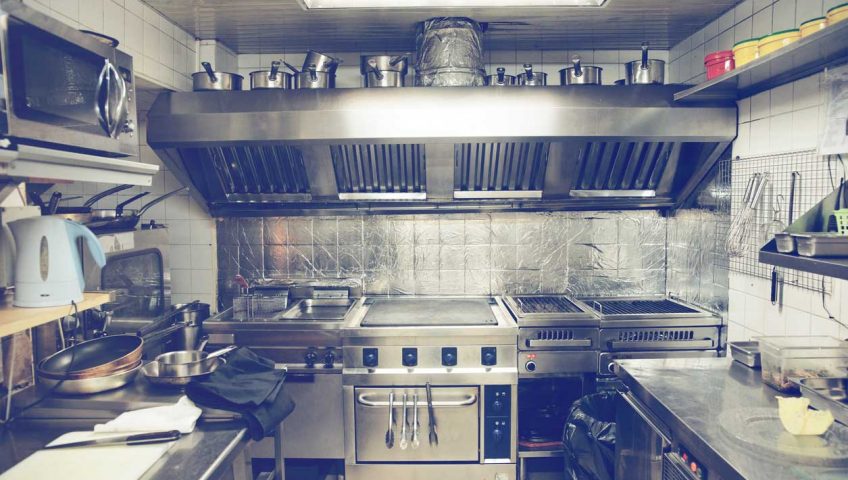 Typical kitchen of a restaurant, toned